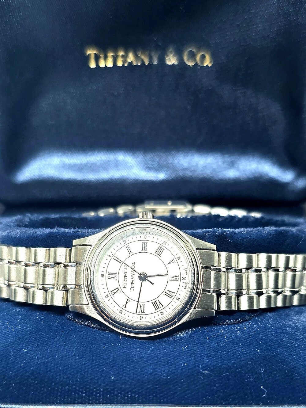 Tiffany & Co. Portfolio Stainless Steel Quartz Watch (Pre-loved) with its origin